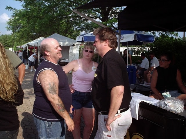 Ken chatting with fans at outdoor event