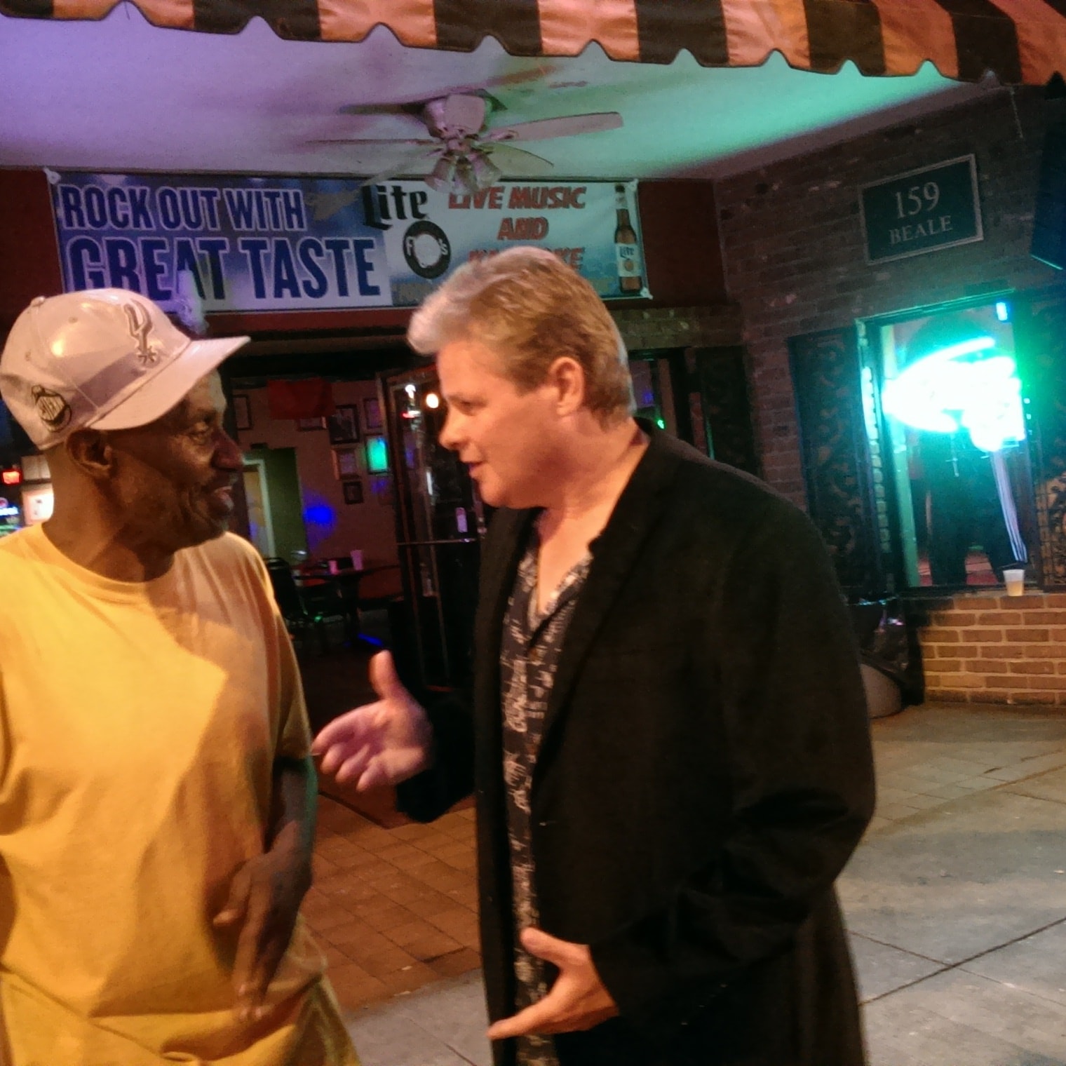 Ken chatting with a fan on Beale Street Memphis