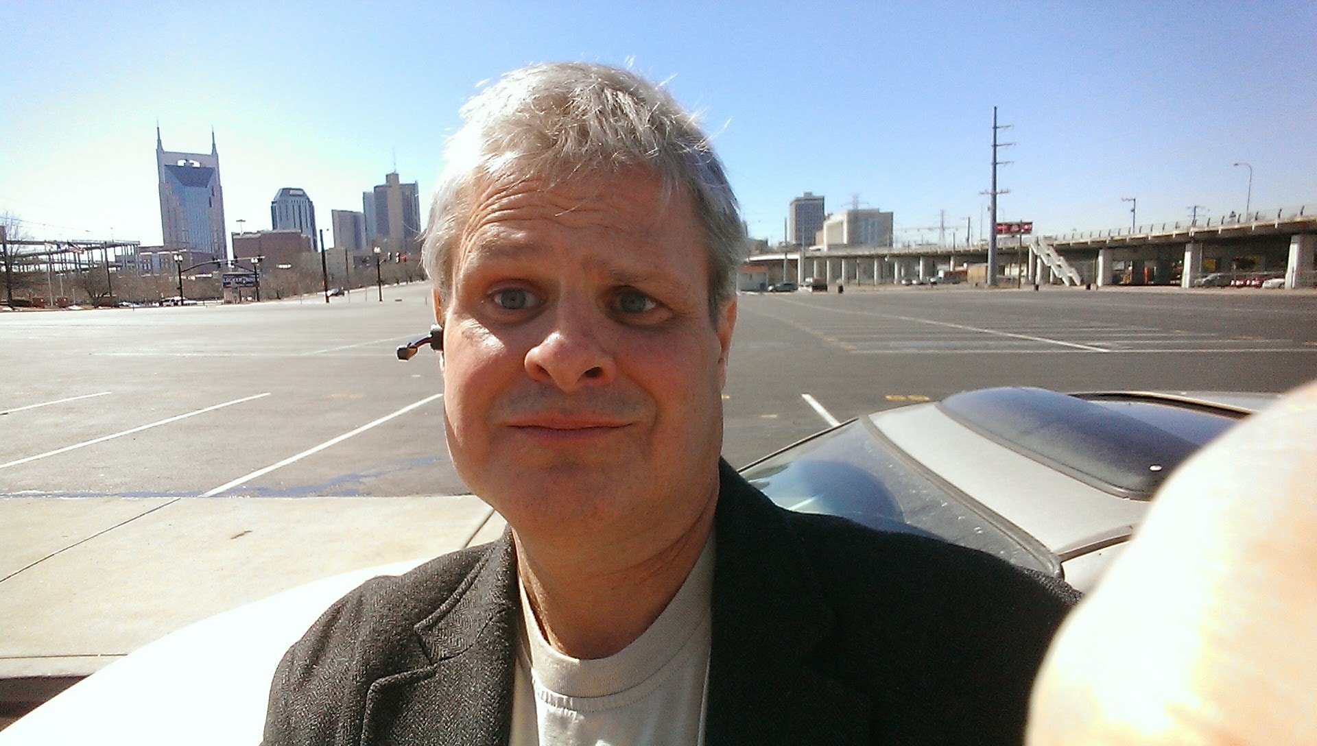 Ken selfie on rooftop cityscape